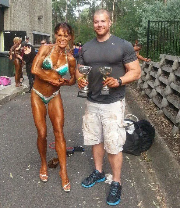 Michael Lea with a bodybuilding competitor he coached